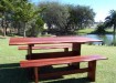 b-p61-Solid-Jarrah-waves-table-showing-freehand-eging